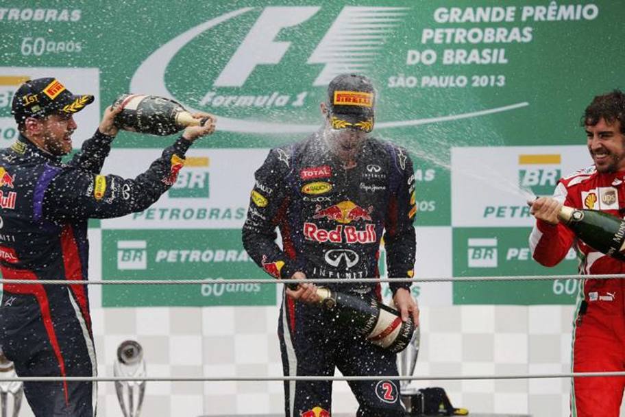 Il podio con Vettel primo, Webber secondo e Alonso terzo. Reuters